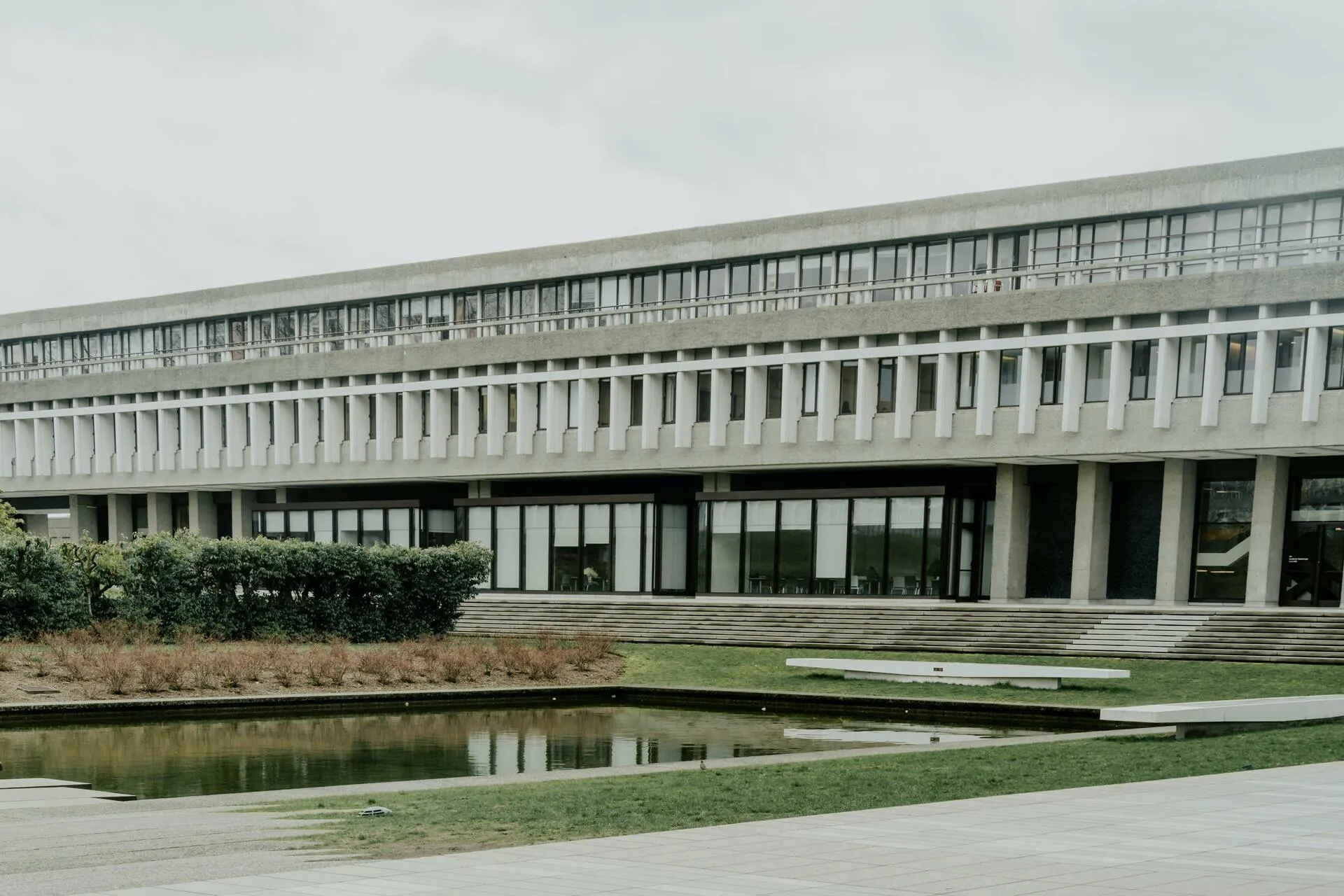 Reflecting pond and brutalist architecture at a Burnaby landmark